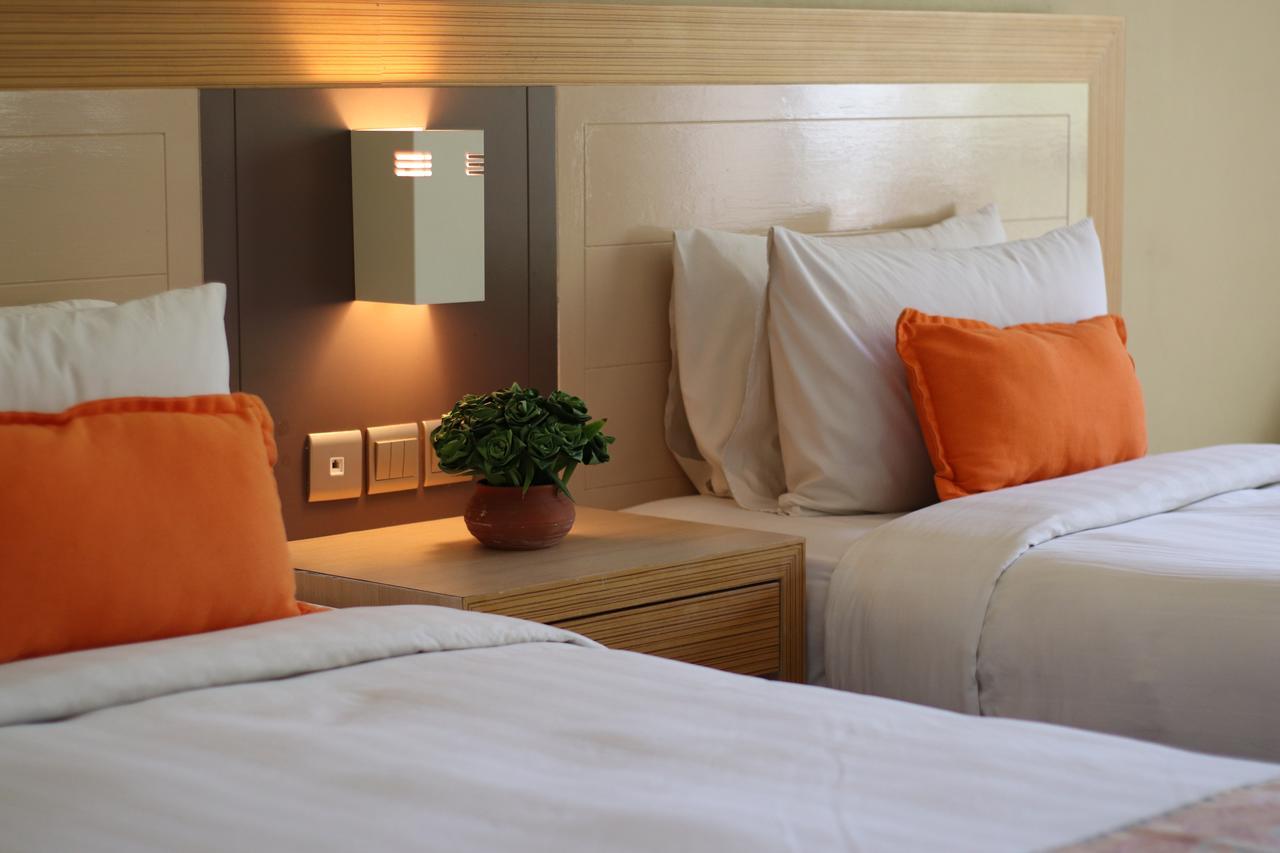 ดาไม ปูริ รีสอร์ท แอนด์ สปา กูชิง ภายนอก รูปภาพ A room at the hotel